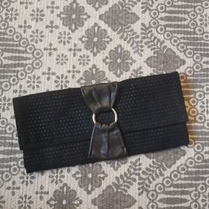 Black clutch with beautiful floral satin lining